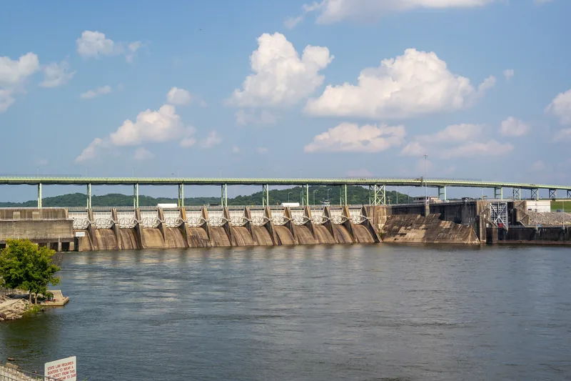 Fort Loudoun Lock and Dam at Lenoir City, with the river in front and a bridge above the spillway.